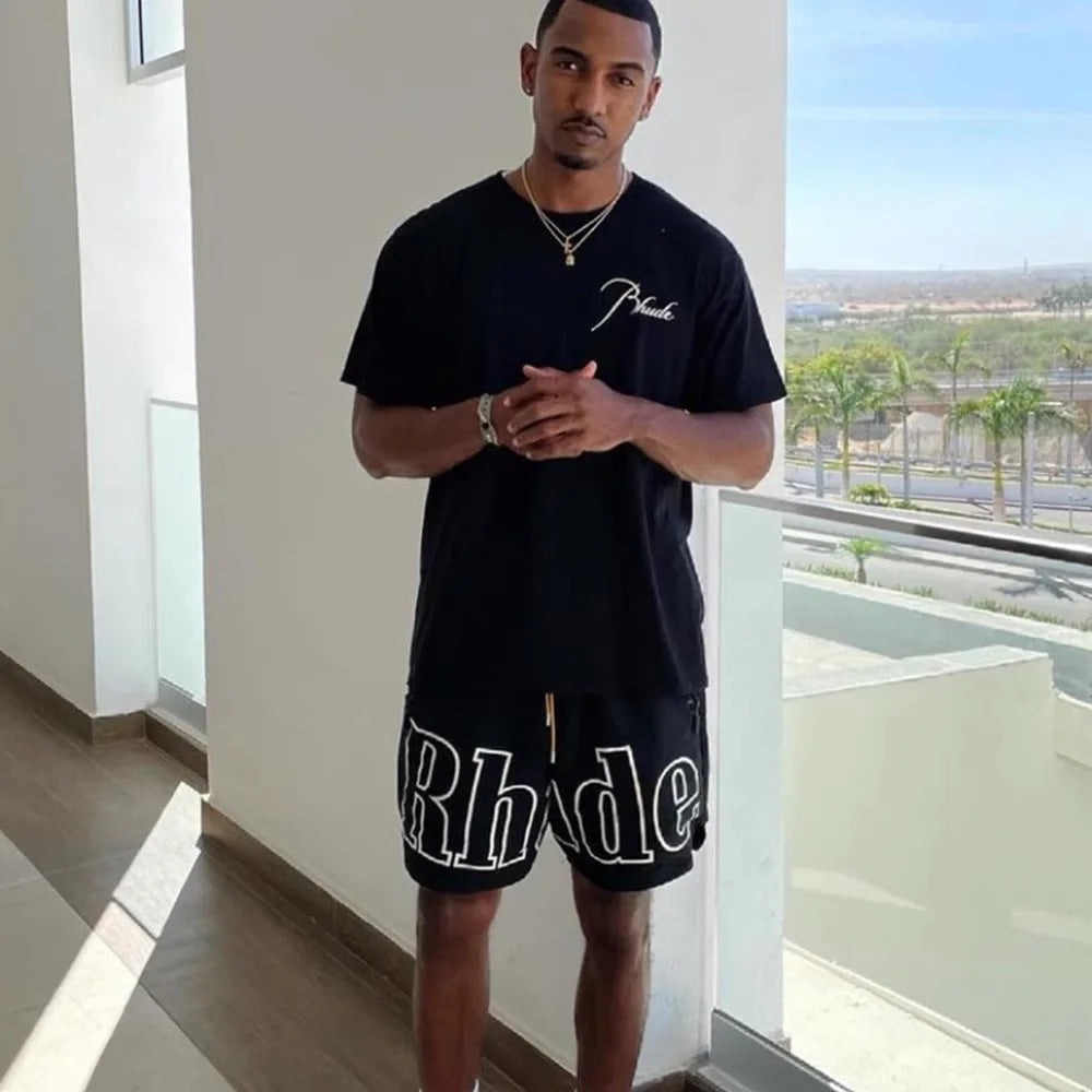 2026 Rhude High Street Trend Casual Shorts Men Woman Letter Print Loose Breathable Light Quick Drying Rhude Sports Shorts