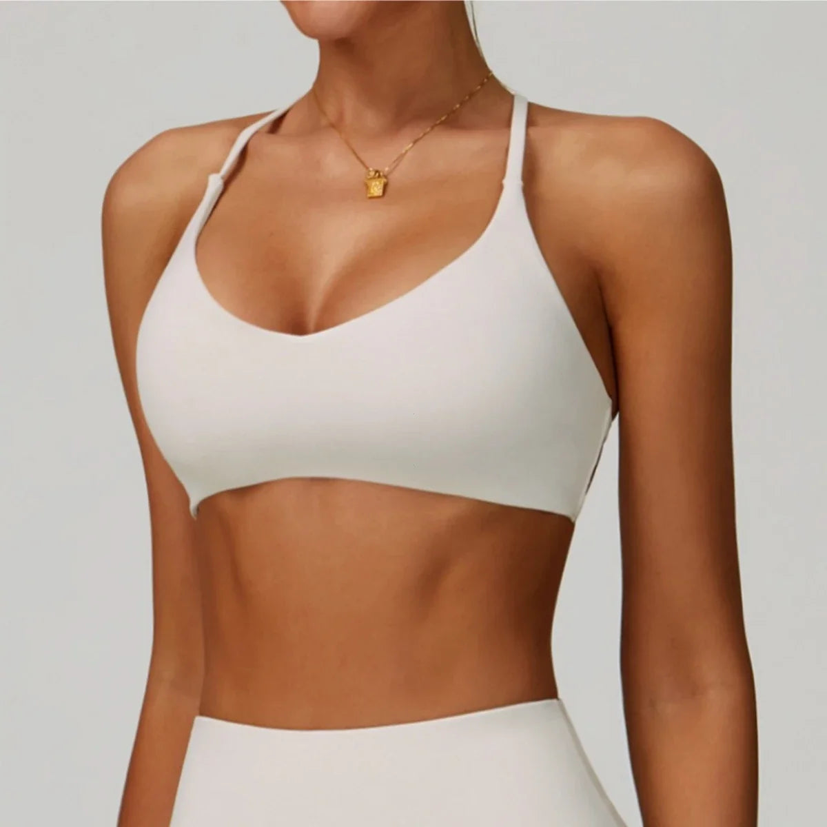 Cross Shoulder Straps Sports Bra For Yoga And Gym Performance